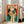 Vintage-inspired art print with surreal retro futurism composition of a woman figure amid numerical and television elements in rich cream, red, and teal hues.