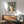 Framed poster presenting an abstract portrait with striking halo imagery in vintage earth tones and deep blues, conveying spiritual and introspective themes.