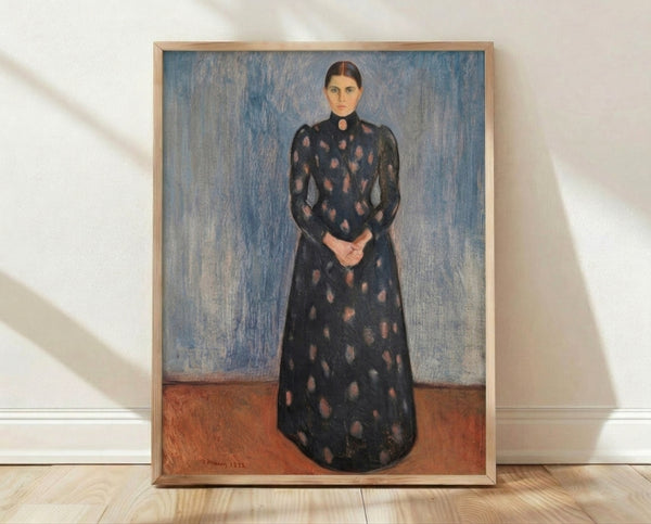 Framed portrait print in muted black and violet tones showing a faceless figure in contemplative pose, rendered in early modernist style with soft, atmospheric brushwork.