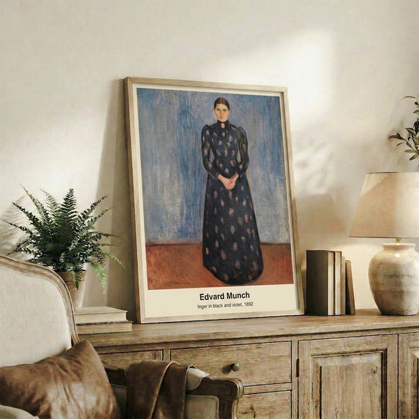 Violet and black toned portrait art print on wall displaying a figure in period clothing with abstracted features, reflective of late 19th century avant-garde aesthetics.
