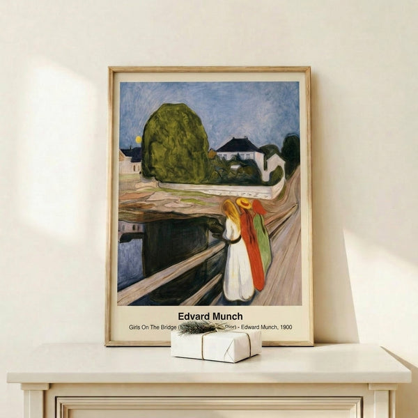 Framed impressionist poster of Girls On The Bridge featuring layered female silhouettes against a moody waterscape, rendered in subdued greens and earth tones with expressive, dreamlike brushwork characteristic of Munch's style.