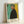Framed two-toned portrait print with distorted features and haunting expression, exemplifying expressionist style with its bold, emotive use of shadow and light.