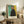 Moody expressionist portrait rendered in two contrasting tones with minimal detail, creating an introspective and somber aesthetic as a framed print.