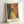 Edvard Munch-style self-portrait wall art depicting an anguished figure amid swirling, hellish brushwork in warm and dark hues.