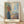 Framed poster of a woman gazing into a mirror in Munch's expressionist style, rendered in muted earth tones with psychological tension.