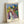 Expressionist-style framed poster with an abstracted human silhouette in cool, subdued colors, capturing a mysterious and introspective atmosphere.