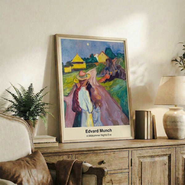Moody artistic print framed on wall, depicting a faceless form rendered in restrained palette of grays, greens, and soft blues with an intimate, nocturnal mood.