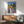 Expressionist art print featuring an undefined portrait in subtle earth tones with blue accents, evoking solitude and introspection.