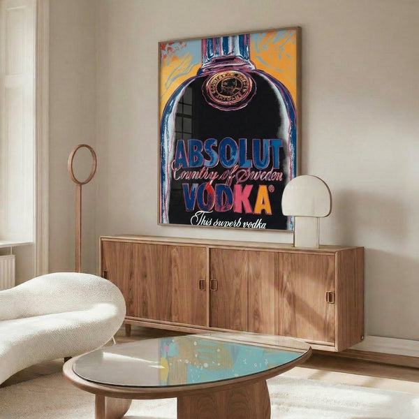 Bright, contemporary framed art featuring a stylized Absolut vodka bottle rendered in vibrant neon tones with bold pop art sensibilities and striking visual impact.
