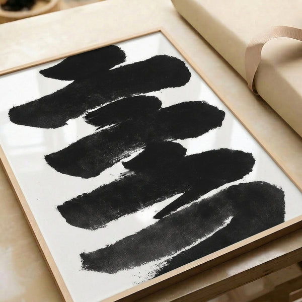 Minimalist black ink abstraction with bold, flowing brushstrokes on white background, a zen-inspired art print.