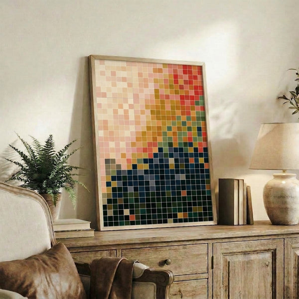 Contemplative color study art print featuring a measured grid layout with muted earth and cool tones blending across framed canvas on interior wall.