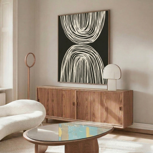 Modern abstract art print in black and cream showing meditative curved contours and structured linear composition.