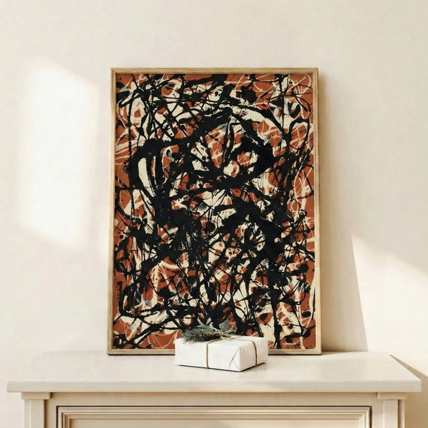 Framed abstract drip composition in warm rust tones and deep black with cream base, modern energetic wall art.