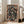 Dynamic abstract painting poster blending burnt orange, rust, black, and tan in flowing drip patterns, contemporary aesthetic.