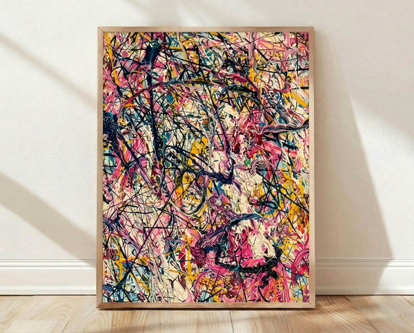 Abstract splatter art print in vibrant pink and yellow with black accents and blue highlights, creating an energetic and dynamic composition on a cream background.