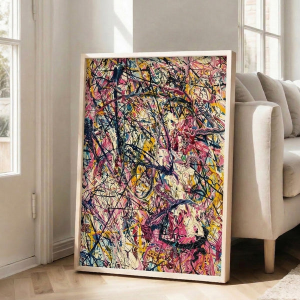 Dynamic abstract artwork with explosive pink and yellow splatters contrasted by darker blue and black strokes, creating a modern and visually striking piece.
