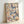 Contemporary abstract expressionist wall art with spontaneous brushwork in cream, blue, orange, green, and black tones, radiating dynamic visual intensity.