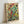 Energetic abstract artwork with chaotic splatter design combining cream, crimson, teal, and yellow tones in contemporary expressive style.