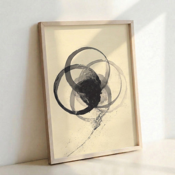 Contemplative abstract poster with interlocking circular forms in grayscale ink wash, evoking a tranquil, zen-inspired aesthetic on a neutral cream ground.