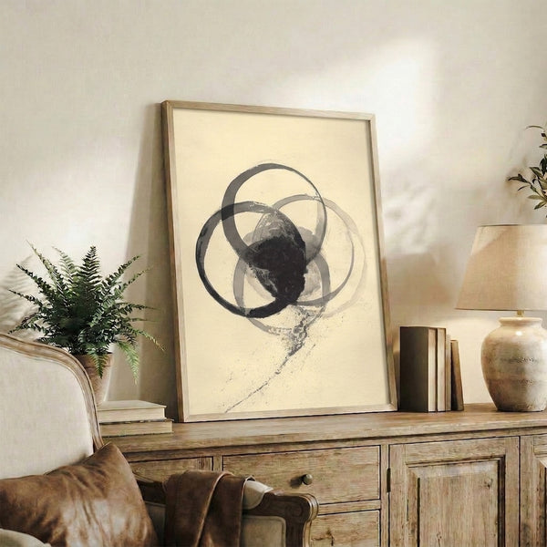 Modern abstract poster displaying overlapping ink wash circles in shades of gray and charcoal on an off-white base, radiating quiet minimalist beauty.