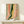 Calm contemporary art print featuring undulating bands of forest green, mustard gold, and pale pink in a modern abstract style.