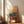 Framed abstract wall art displaying a minimalist pixel grid that shifts through warm earth tones to cool jewel tones, blending geometric precision with contemplative simplicity.