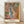 Impressionist framed poster of a woman in soft pastels and warm ochres, capturing an intimate domestic moment with refined elegance and muted earth tones.