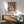 Framed wall poster of a bathing figure in muted earth tones and soft pastels, capturing an intimate moment with Impressionist subtlety and refinement.