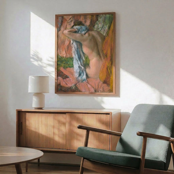 Art print wall hanging showing a woman drying her neck in a moment of quiet solitude, painted with delicate impressionistic brushstrokes and a harmonious palette of warm neutrals.