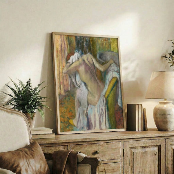 Framed masterpiece print showing an intimate bathing scene with abstracted human form in Degas's characteristic pastel palette of warm and cool hues.