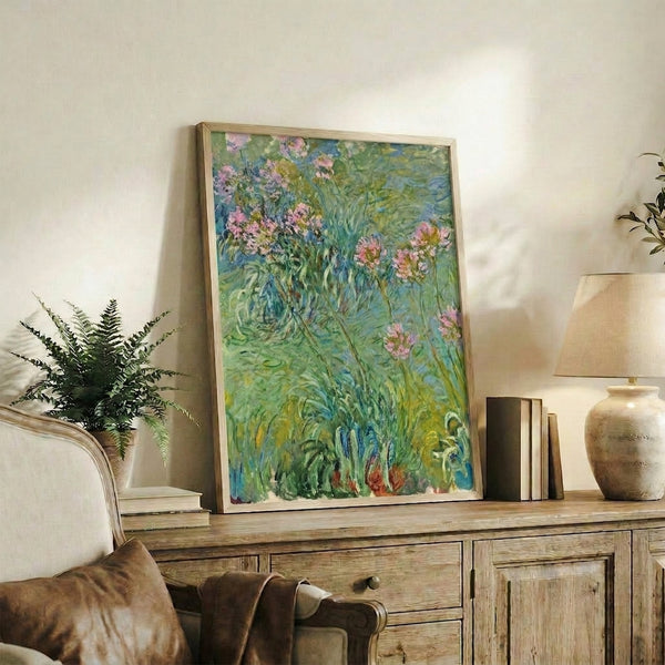 Framed watercolor art print of agapanthus flowers rendered in soft blues and purples with gentle impressionist brushwork and peaceful mood.