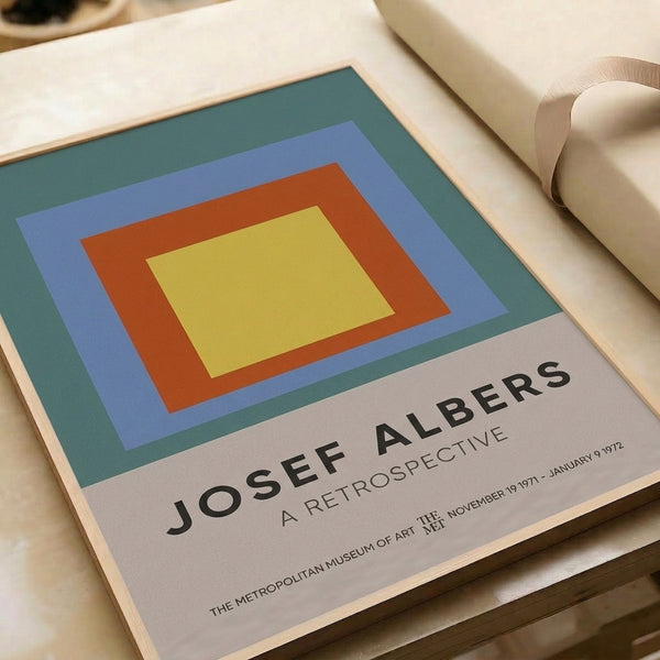 Bauhaus-inspired geometric artwork of nested squares in periwinkle blue, golden yellow, rust orange, and teal; minimalist poster with contemplative mood.