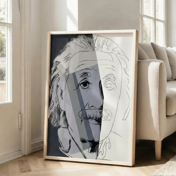 Framed pop art print of Albert Einstein rendered in striking complementary colors with Warhol's signature flattened, high-contrast aesthetic.
