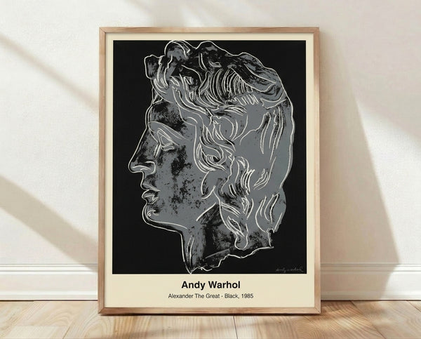 Bold pop art portrait of Alexander the Great in black, white, and grey tones, featuring a faceless modernist design inspired by Warhol's iconic style, framed on a wall.