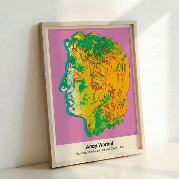 Iconic pop art portrait with vivid pink and green hues and bold black outlines, displayed as a framed wall art print in modern aesthetic.
