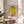 Bold contemporary pop art framed poster with a figure rendered in bright pink, lime green, and monochromatic tones.