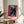 Modern pop art portrait of Alexander the Great in vibrant pink and white tones with dramatic black outlines, gallery-style framed print.