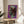 Alexander the Great rendered in luminous purple shades using bold pop art techniques, displayed as a sophisticated wall-mounted poster print.