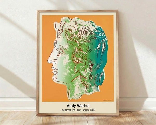 Bold pop art portrait of Alexander the Great rendered in vibrant yellow, magenta, and black with white accents, in the iconic style of Andy Warhol's famous silkscreen prints.
