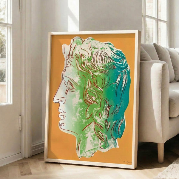 Vibrant yellow pop art print of Alexander the Great mounted on wall, exemplifying bold color theory and graphic simplification typical of contemporary art movements.