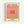 Framed modern pop art print depicting a stylized sunset with soft peach and orange tones against a cream background, creating a warm and meditative atmosphere.