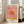 Modern pop art interpretation of a sunset with contemplative warmth, rendered in rose pink, cream, and golden yellow tones with minimalist style.