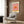 Modern pop art sunset poster featuring minimalist sun and sky in warm peach and orange tones, creating a serene and meditative visual experience.