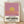 Pop art sunset poster with a large glowing sun in golden yellow and mauve pink tones against a minimalist horizon, framed wall art in modern style.