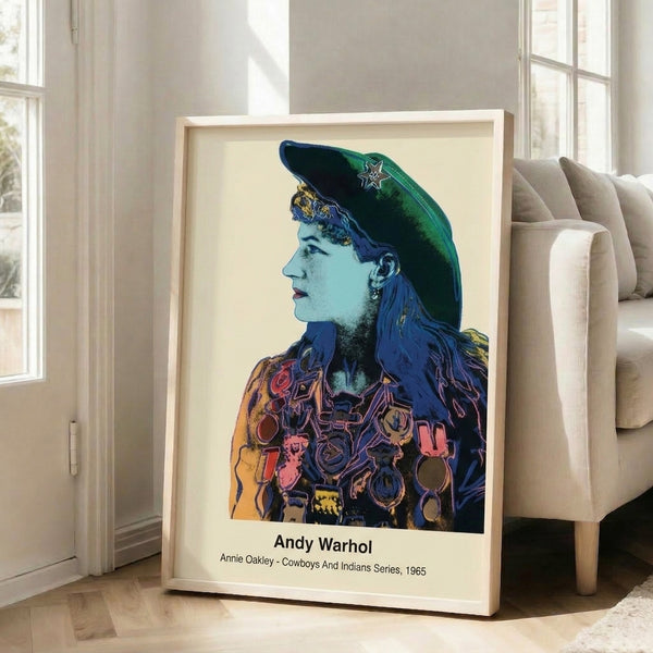 Iconic pop art poster of Annie Oakley rendered in vivid primary hues and graphic black lines, capturing the spirit of classic Western Americana on a framed print.