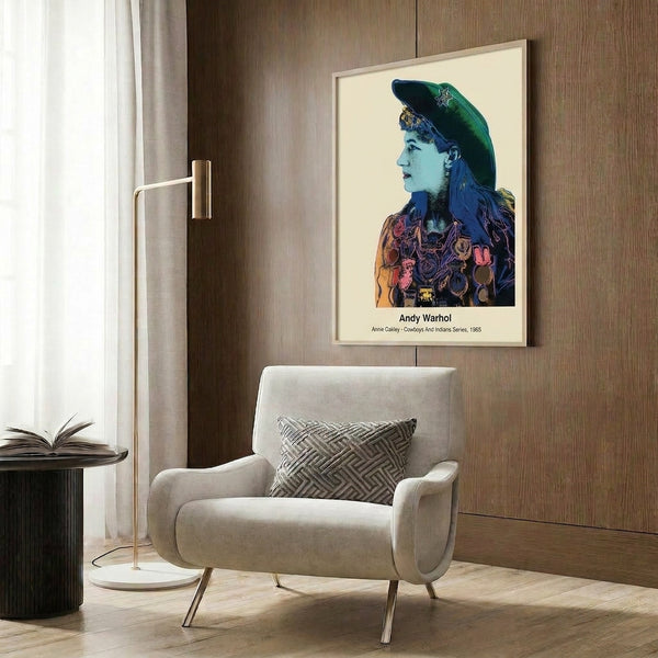 Annie Oakley portrait rendered in eye-catching pop art style with vivid red, yellow, and blue tones, presented as a framed poster capturing cowboy era nostalgia.