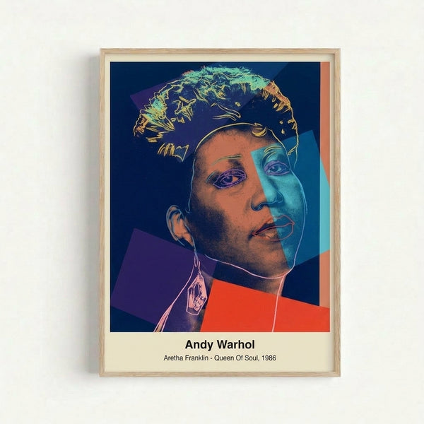 Framed pop art print featuring Aretha Franklin's face in contrasting neon colors—bright pink, electric blue, and yellow—against a stark black and white background.