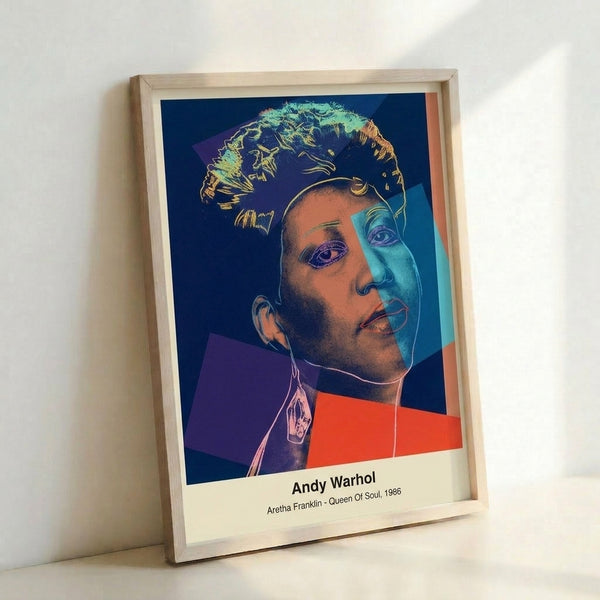 Modern pop art poster celebrating the Queen of Soul with Aretha Franklin's portrait in eye-catching magenta, cyan, and golden yellow hues in Warhol's signature style.