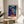 Striking pop art depiction of Aretha Franklin's iconic face in luminous pink, blue, and yellow colors with high-contrast black details, inspired by Andy Warhol's method.