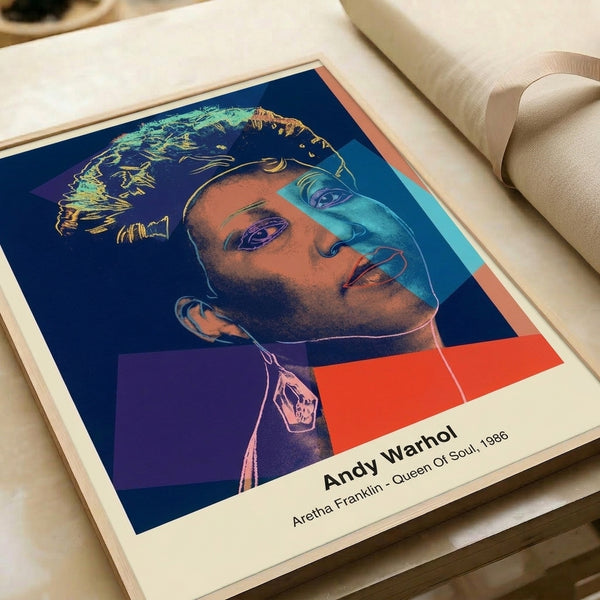 Pop art portrait of Aretha Franklin, the Queen of Soul, featuring her face in striking pink, blue, and yellow tones with strong black definition in Warhol's signature aesthetic.